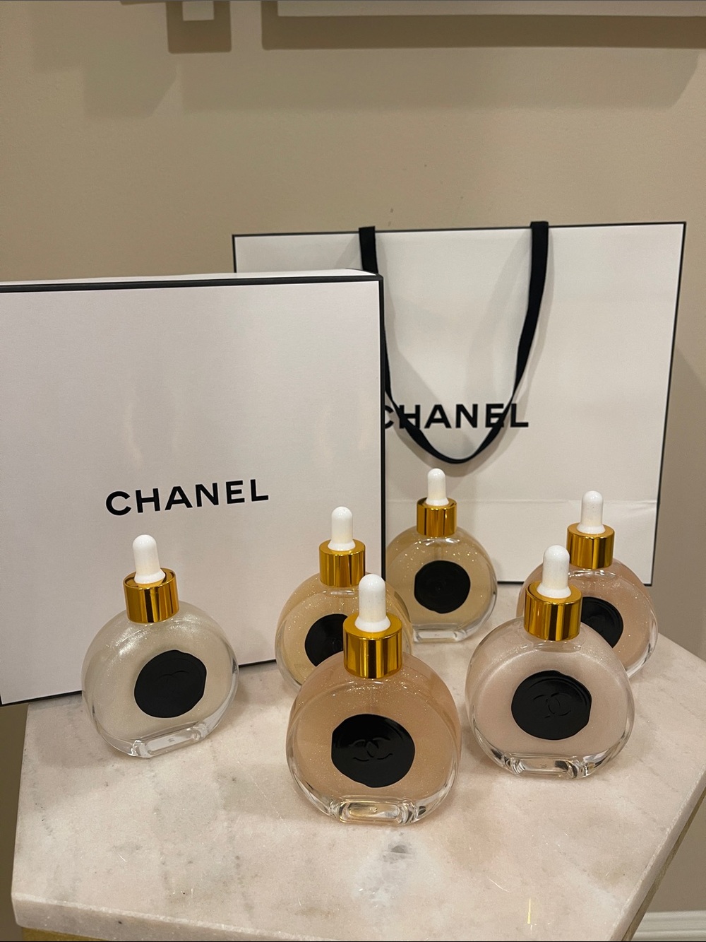 CHANEL Illuminating Shimmering Body Oil Fragrance Drop Bottles.
